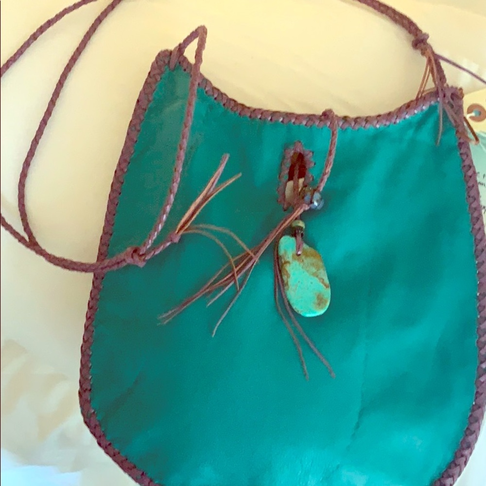 Handmade one if a kind leather and turquoise bag